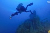 Diver Fontas Pitsinelis near the funnel of ALTAIR.